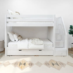 White wooden bunk bed with built-in storage stairs in a modern bedroom setting.