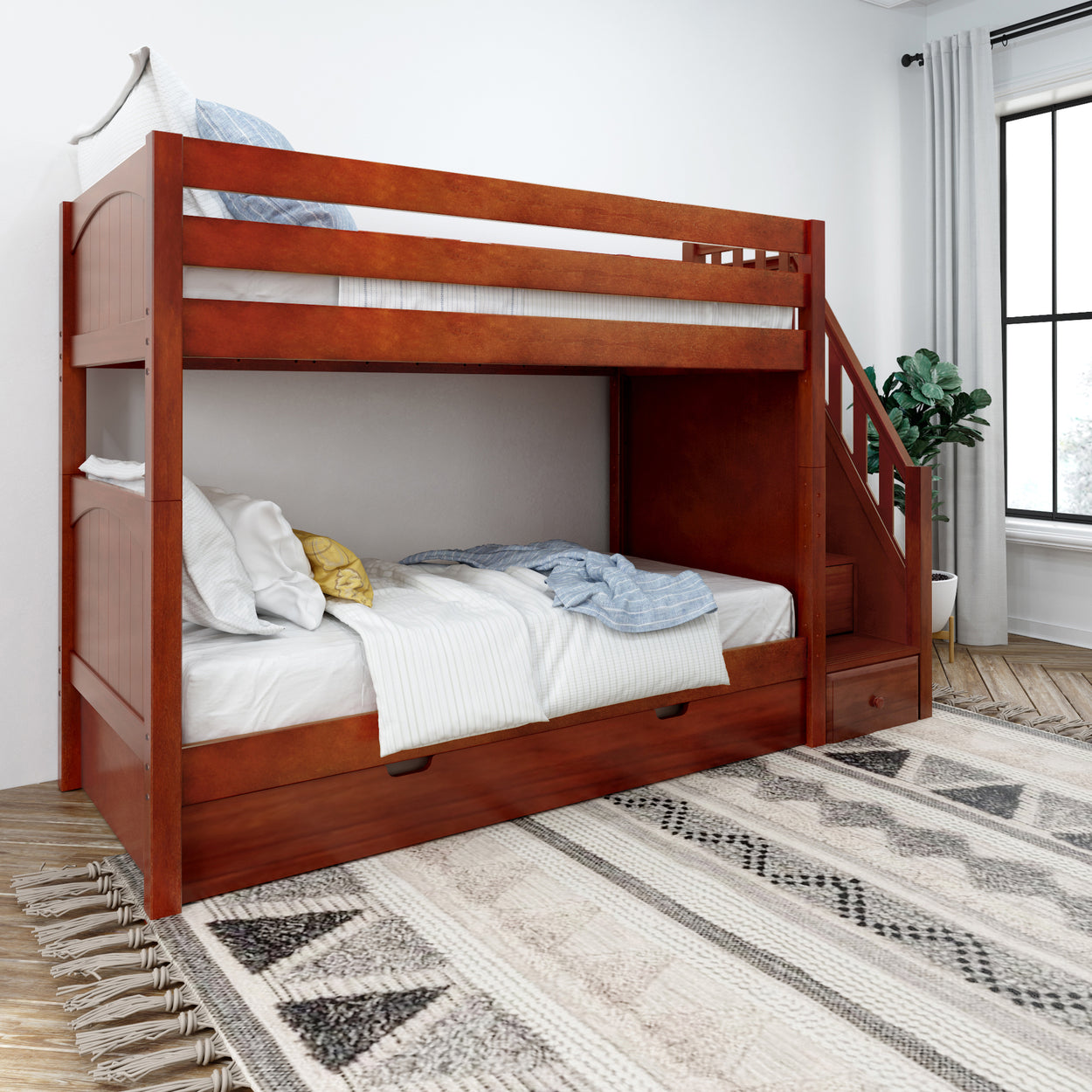 Wooden bunk bed with stairs in a modern bedroom featuring striped bedding and a geometric rug.