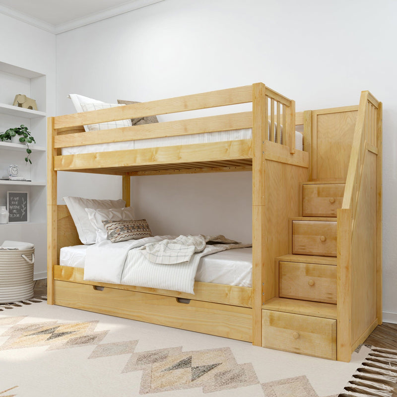Light wood bunk bed with built-in storage stairs and under-bed trundle in a bright neutral children's bedroom with cozy bedding and geometric rug