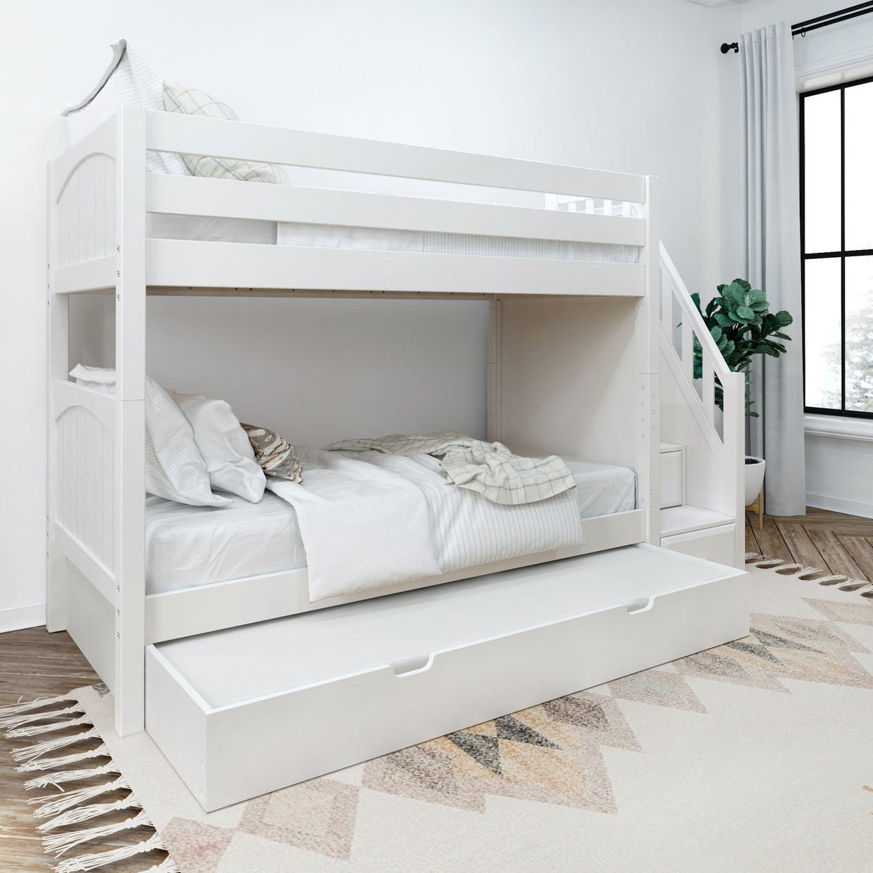 White wooden bunk bed with trundle in a modern bedroom setting.