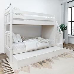 White wooden bunk bed with pull-out trundle in modern bedroom setting.
