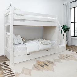 White wooden bunk bed with stairs and storage in modern children's bedroom.