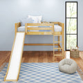 Wooden kids loft bed with slide and ladder in bright children's bedroom, blue striped pillows, teddy bears and wicker toy basket