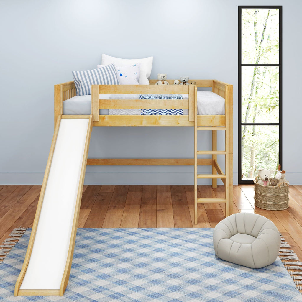 Natural wood kids loft bed with slide and ladder in a bright modern children's bedroom, blue checkered rug, plush toys in a basket and tall window with outdoor view