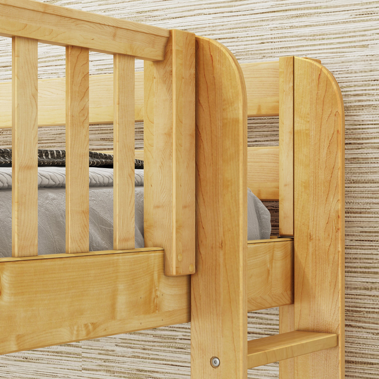 Natural wood bunk bed with a cozy mattress in modern bedroom setting.