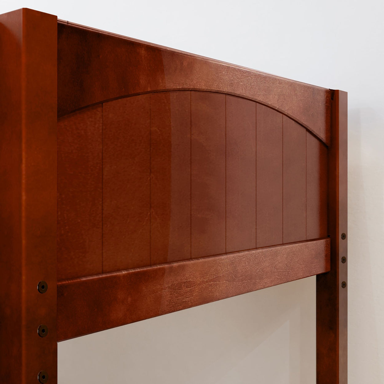 Wooden headboard with rich brown finish and panel design.