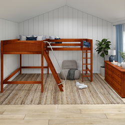 Loft bed with wooden frame and ladder in modern bedroom featuring a cozy rug, armchair, and potted plant.