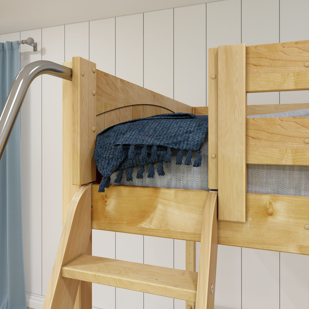 Wooden bunk bed with blue textured blanket and ladder in cozy bedroom setup.