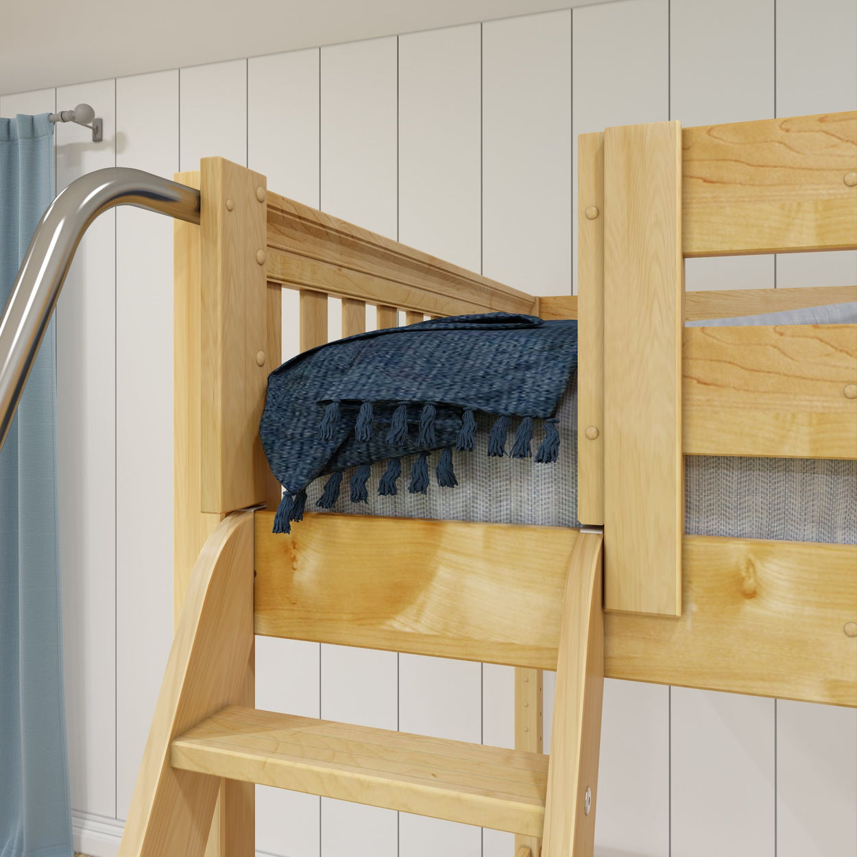 Wooden loft bed with a blue blanket, ladder, and modern design.