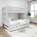 White wooden twin-over-full bunk bed with built-in storage trundle in a bright modern bedroom with white bedding, geometric rug, hardwood floors, large window and potted plant
