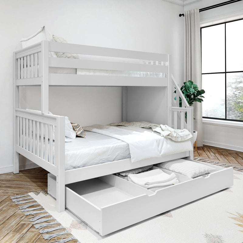 White wooden full-over-full bunk bed with pull-out storage drawer, neutral bedding, ladder stairs, potted plant and large window in a bright modern kids' bedroom on hardwood floor