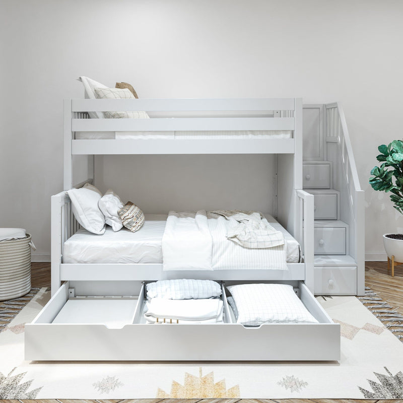 White wooden bunk bed with pull-out trundle and built-in staircase storage in a modern neutral kids' bedroom with white linens and potted plant