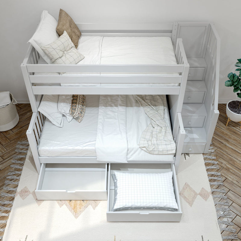 White wooden twin-over-full bunk bed with built-in staircase drawers and under-bed storage, neutral bedding on hardwood floor in modern kids' bedroom