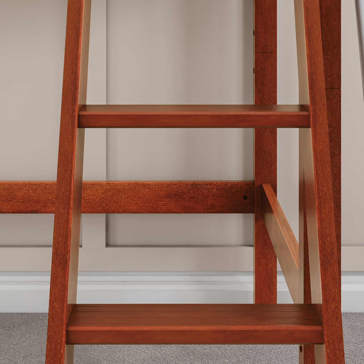 Wooden ladder against a beige wall with carpeted floor, ideal for home and office decor.