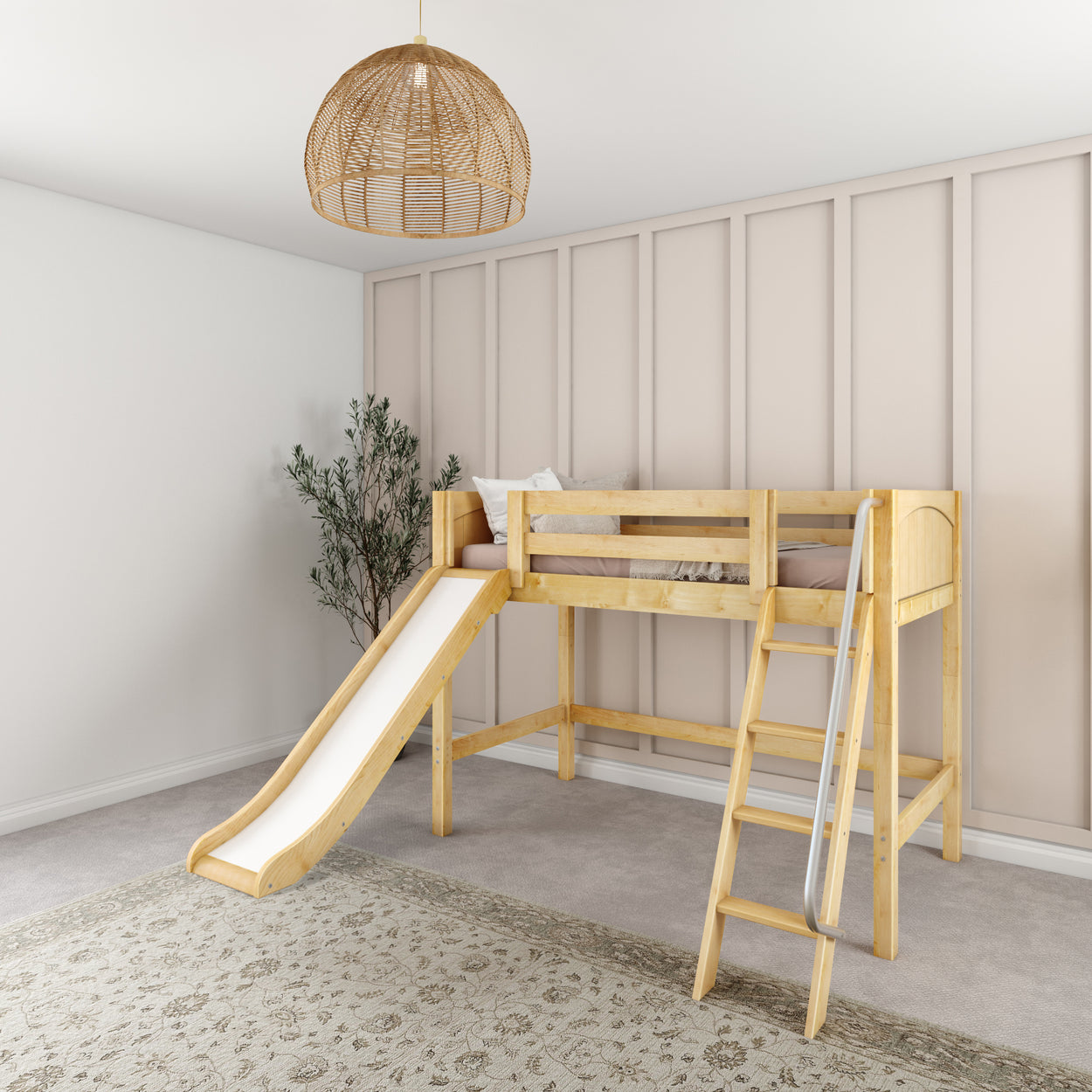 Loft bed with slide and ladder in a modern kids' room featuring a beige carpet and woven pendant light.