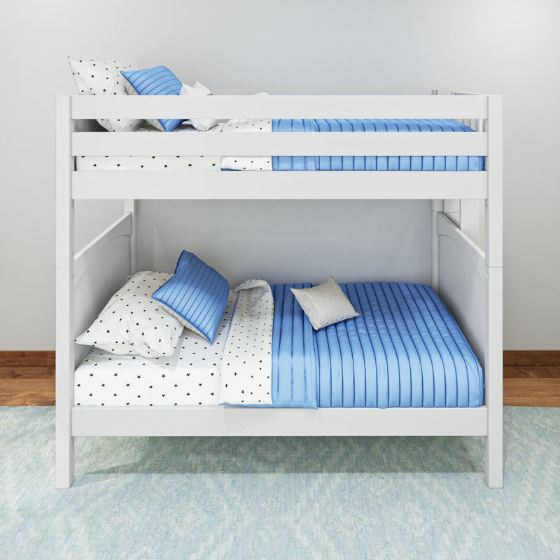 White wooden bunk bed with blue quilted comforters, star-print sheets and pillows in a modern kids' bedroom