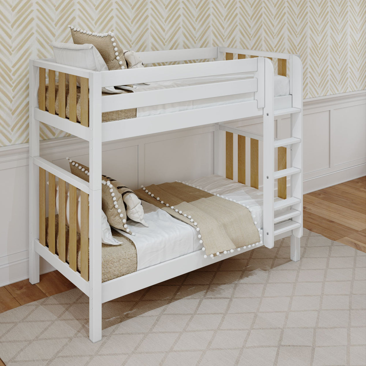 White wooden bunk bed with neutral bedding and pillows in a stylish children's room with geometric wallpaper and wooden floor.
