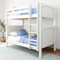 White wooden bunk bed with ladder, blue quilted bedding and star-patterned sheets in a modern kids' bedroom, space-saving design