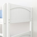 Close-up of white wooden bunk bed headboard and safety rail with arched panel design and blue mattress, modern farmhouse kids' bedroom furniture