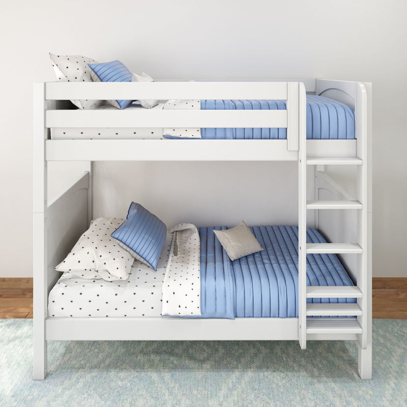 White wooden bunk bed with blue quilted bedding, star-print sheets and ladder in a modern kids' bedroom