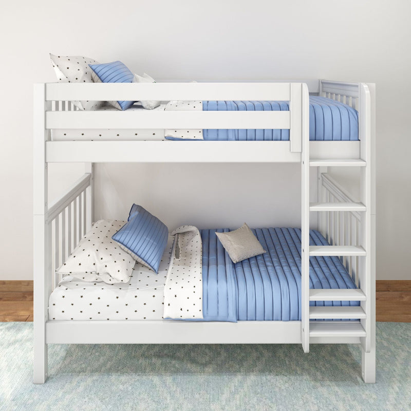 White wooden bunk bed with blue quilted bedding, star-print sheets and pillows, side ladder in a modern kids' bedroom
