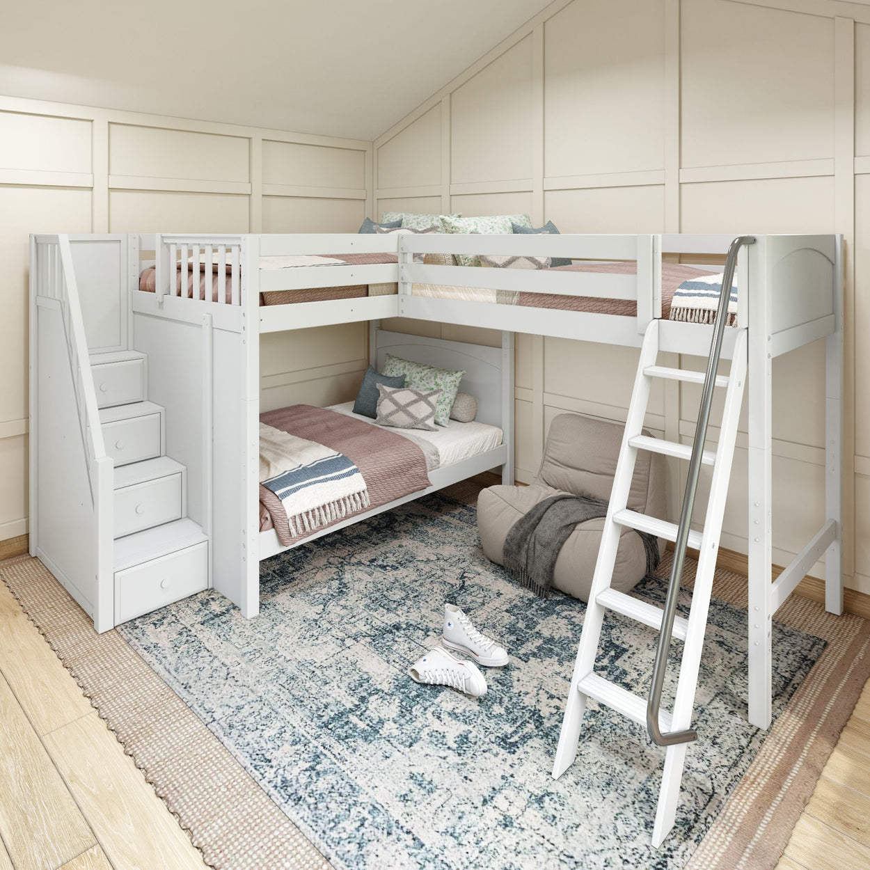 Modern white loft bed with stairs, cozy pillows, and decorative rug in a stylish bedroom setting.