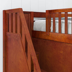 Wooden loft bed with staircase and railing detail.