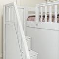 White wooden twin-over-twin bunk bed with built-in storage stairs, slatted safety rail and mauve quilt in modern kids' bedroom