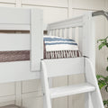 White wooden loft bunk bed with ladder, blue-and-white striped fringed throw on mattress, and green plant in a modern farmhouse kids' bedroom, space-saving kids bedroom furniture