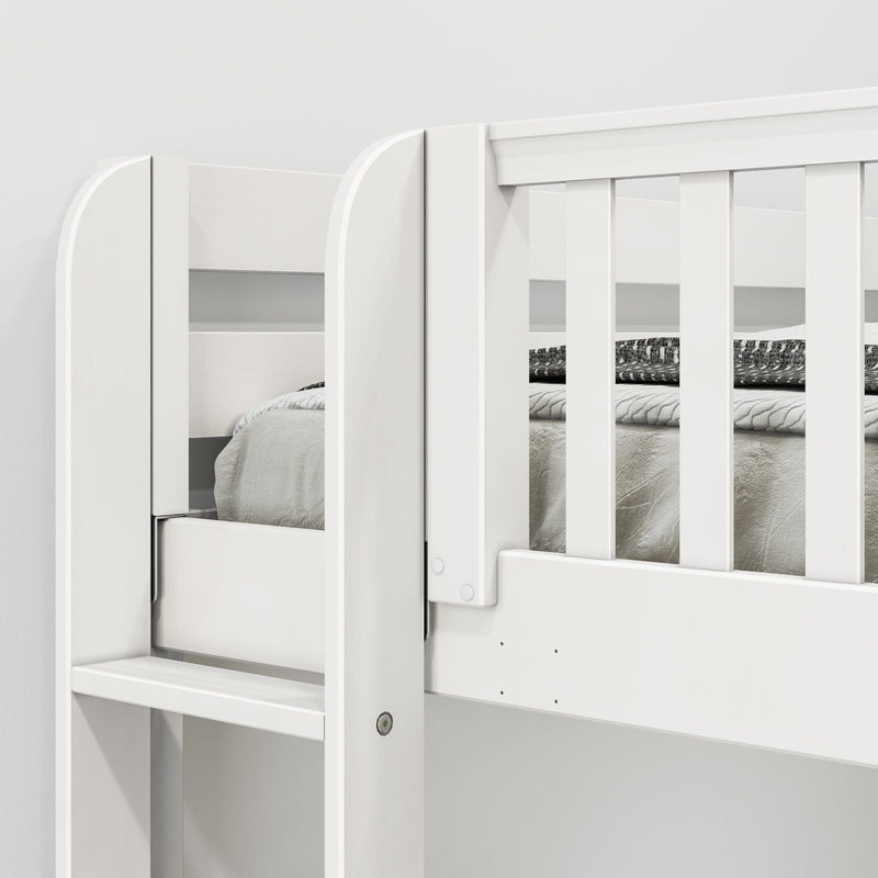 Close-up of a white wooden loft bunk bed with built-in ladder, slatted safety guardrail and mattress, modern children's bedroom furniture