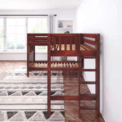 Dark wood loft bed in modern bedroom with geometric area rug and large window.