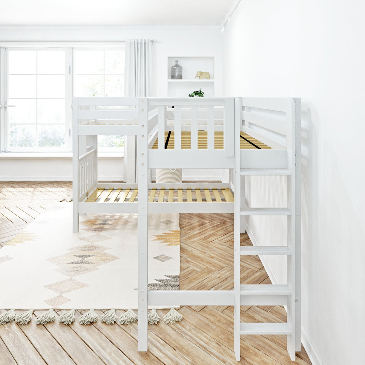 White wooden loft bed with ladder in a bright, minimalist bedroom with a large window and natural light.