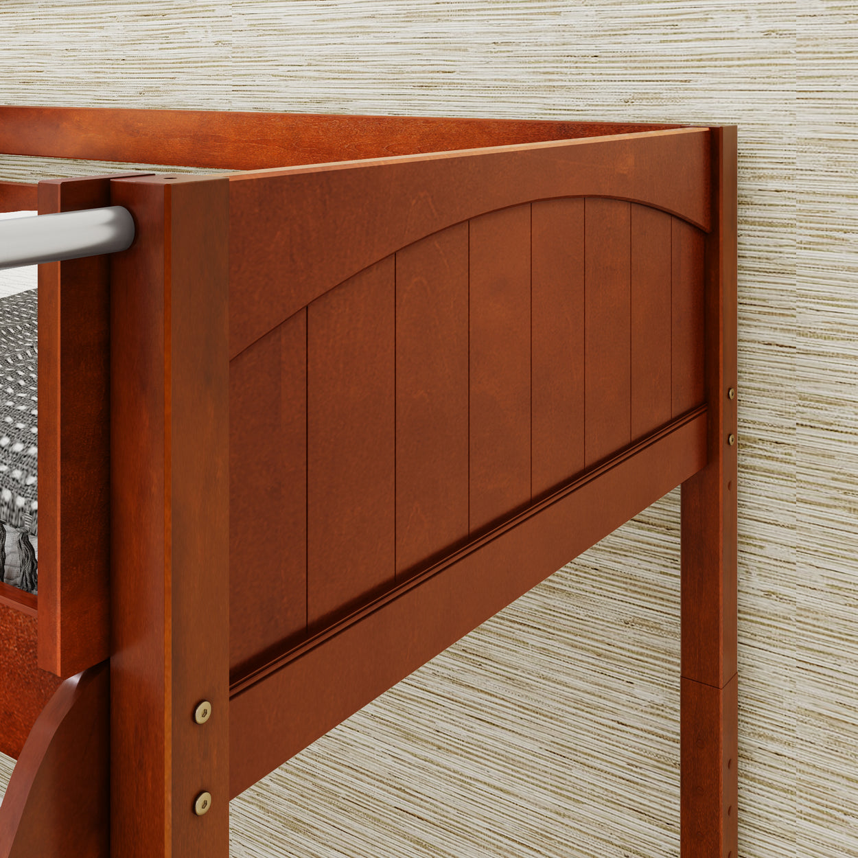 Wooden bunk bed frame with curved headboard design against a textured wall.