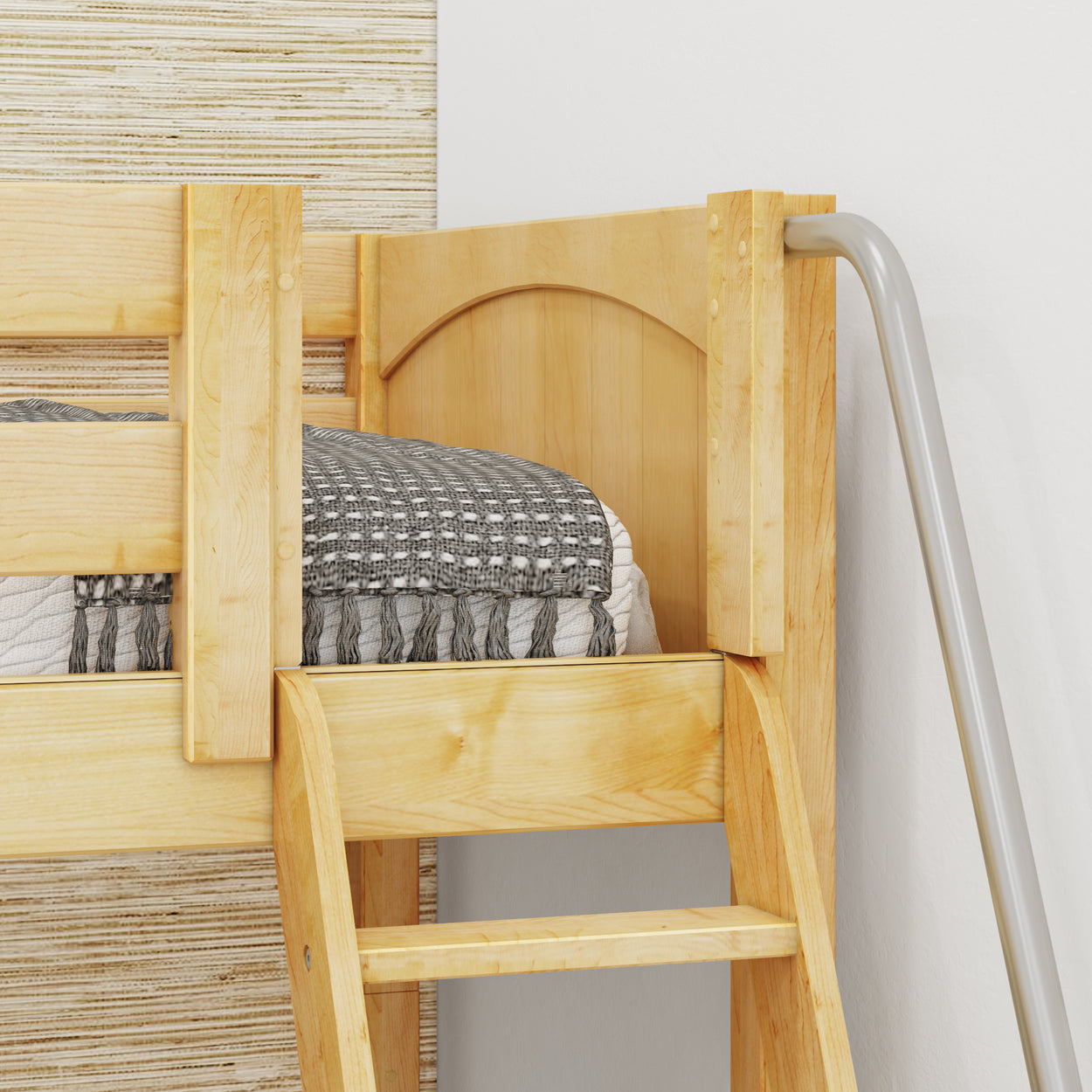 Wooden bunk bed with ladder and cozy gray blanket in a modern bedroom.