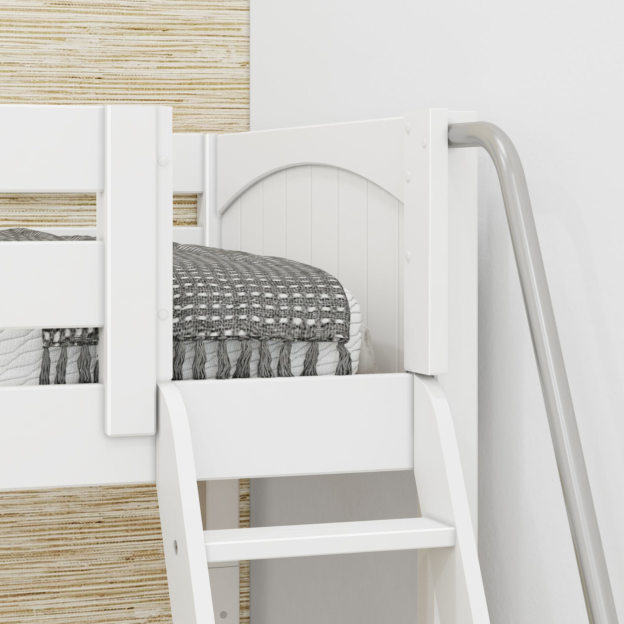White wooden bunk bed with gray duvet and decorative pillows, featuring a sturdy ladder and light wood accent wall.