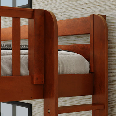 Wooden bunk bed close-up with a modern design and white bedding in a stylish bedroom setting.