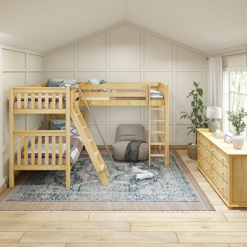 Natural wood twin-over-twin bunk bed with ladder and metal handrail in a bright children's bedroom featuring a patterned rug, wooden dresser, potted plants, and window light