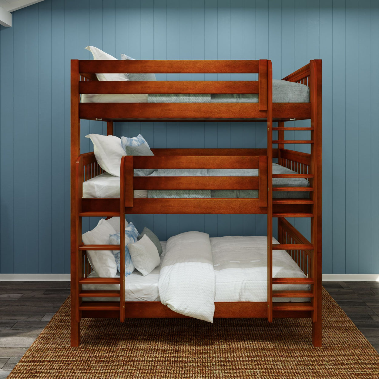 Triple bunk bed with wooden frame and white bedding in a modern bedroom with blue paneled walls.