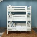 White wooden triple bunk bed with ladder, light teal bedding and decorative pillows in a kids' bedroom against a blue shiplap wall on a woven jute rug