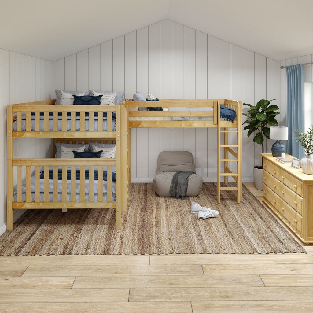 Wooden bunk beds with ladder in cozy kids' bedroom featuring blue bedding, shiplap accent wall, woven jute rug and natural wood dresser
