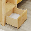 Open light wood bedroom dresser drawer with wooden knob, visible joinery and natural wood grain interior on hardwood plank floor