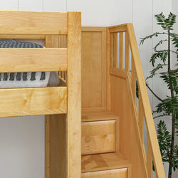 Natural wood bunk bed with built-in stairs and cozy bedding in a modern interior setting.