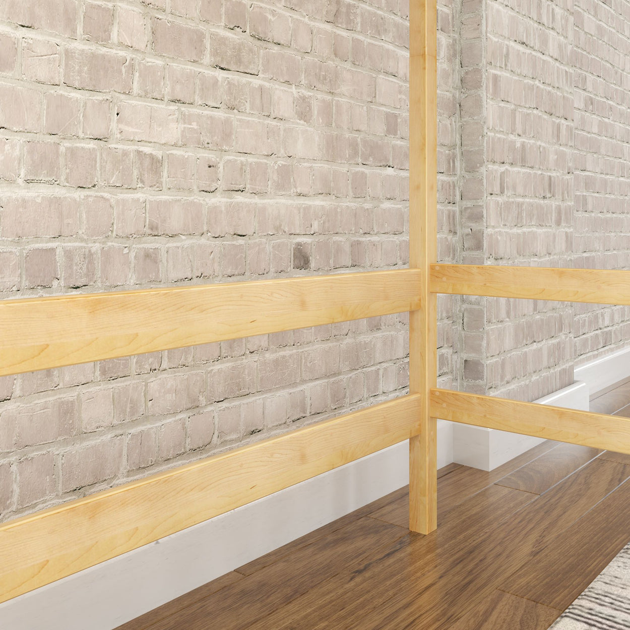 Wooden modern staircase railing with beige brick wall background and hardwood floor.