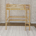 Wooden loft bed with ladder and neutral pillows and blankets set against an exposed white brick wall over hardwood floors and a patterned area rug