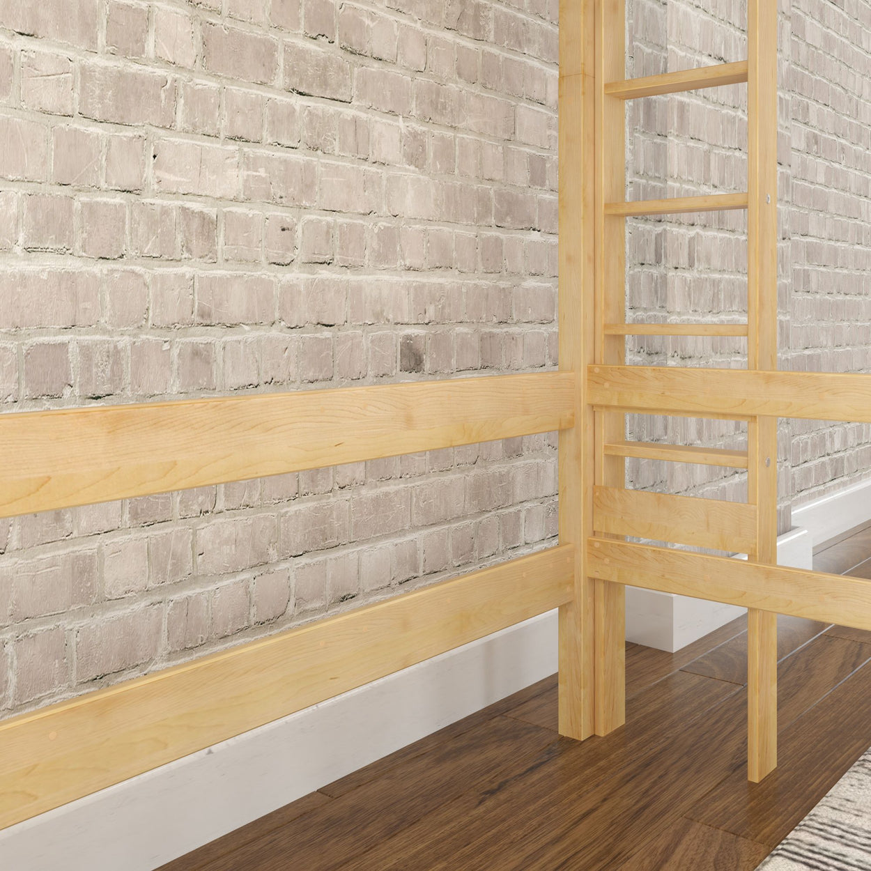Wooden loft bed frame against a brick wall in a modern bedroom setting.