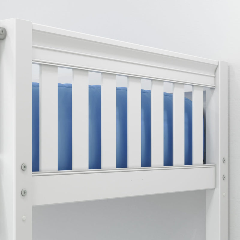 Close-up of white wooden baby crib rail with vertical slats and blue bedding, modern nursery safety rail detail