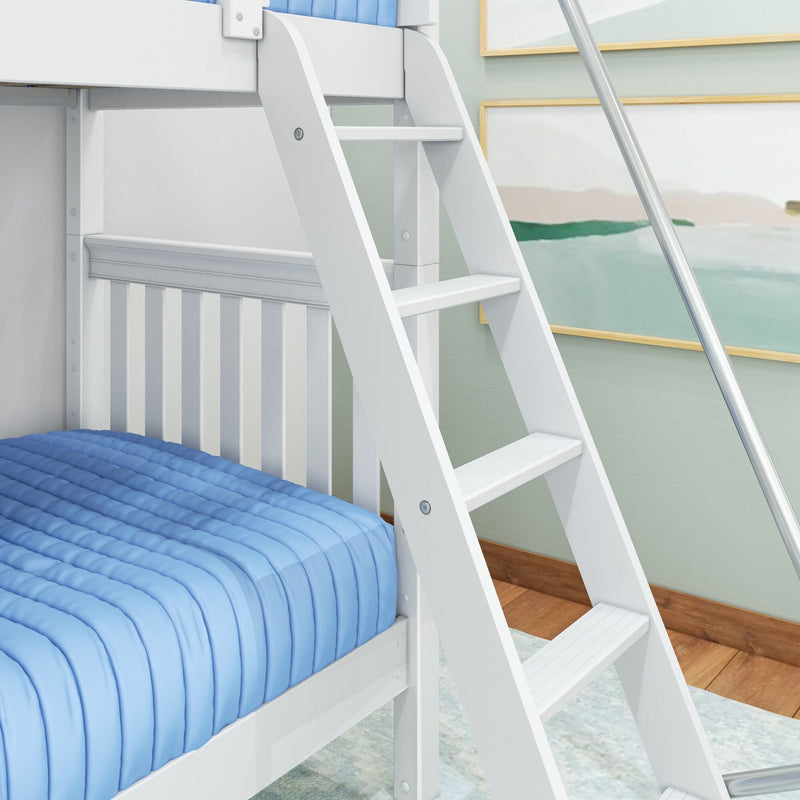 White wooden ladder on a children's bunk bed with blue quilted bedding, white crib rail and framed coastal wall art in a light-green kids' bedroom