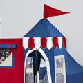 Children's red and blue play tent castle with peaked roof and red flag, indoor fabric playhouse for kids