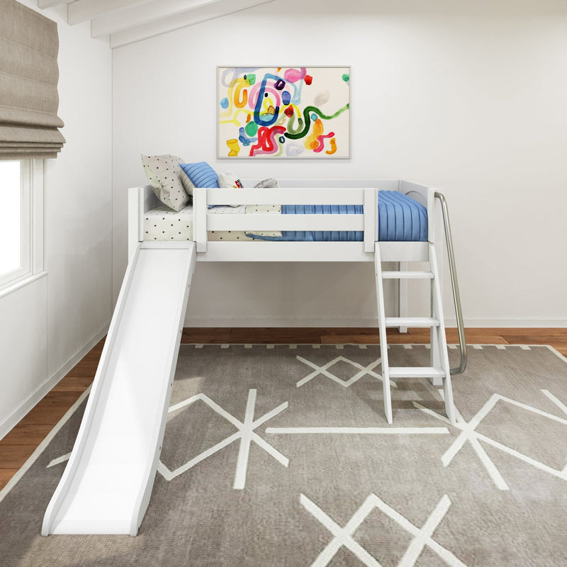 White kids loft bed with slide and ladder, blue quilted bedding and star-print pillows in a modern kids bedroom with colorful abstract wall art and beige roman shade