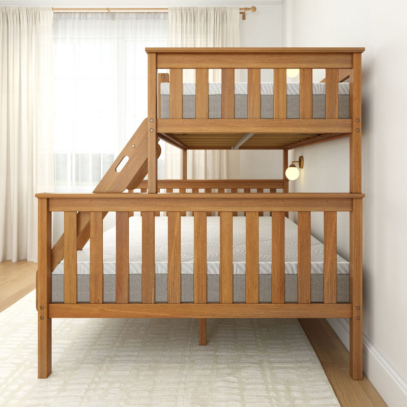 Wooden twin over full bunk bed with mattresses and modern design in a bright bedroom.